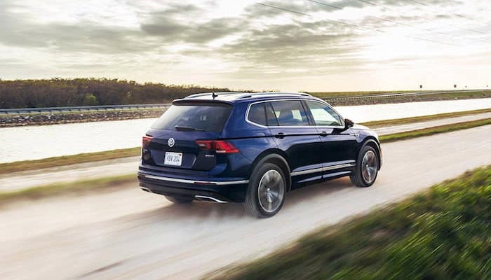 Volkswagen Tiguan exterior driving alongside a lake